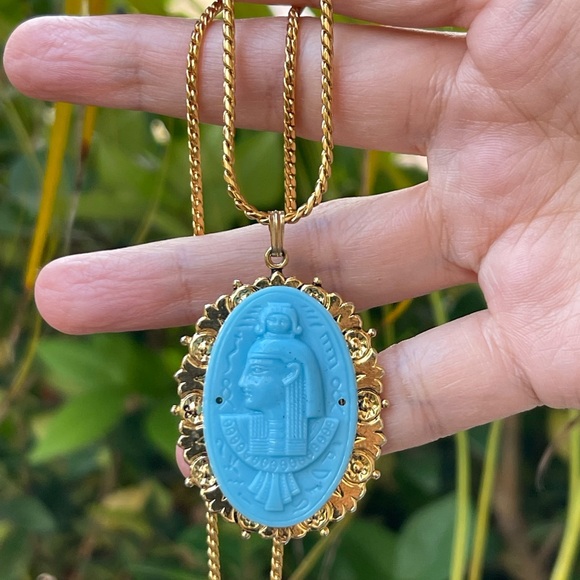 Turquoise color pressed glass Egyptian revival pendant & gold tone chain